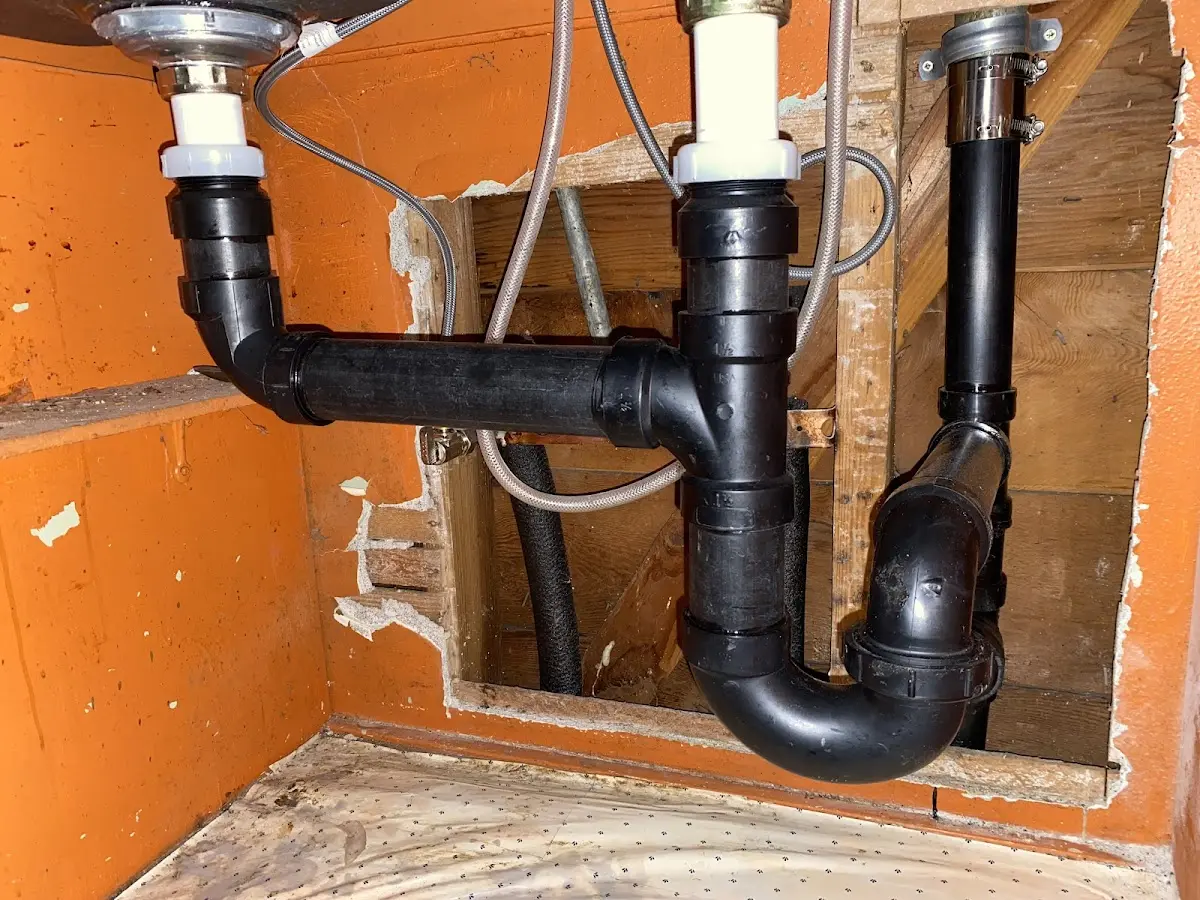 Professional Garbage Disposal Repair equipment and tools on the job in Bentonville